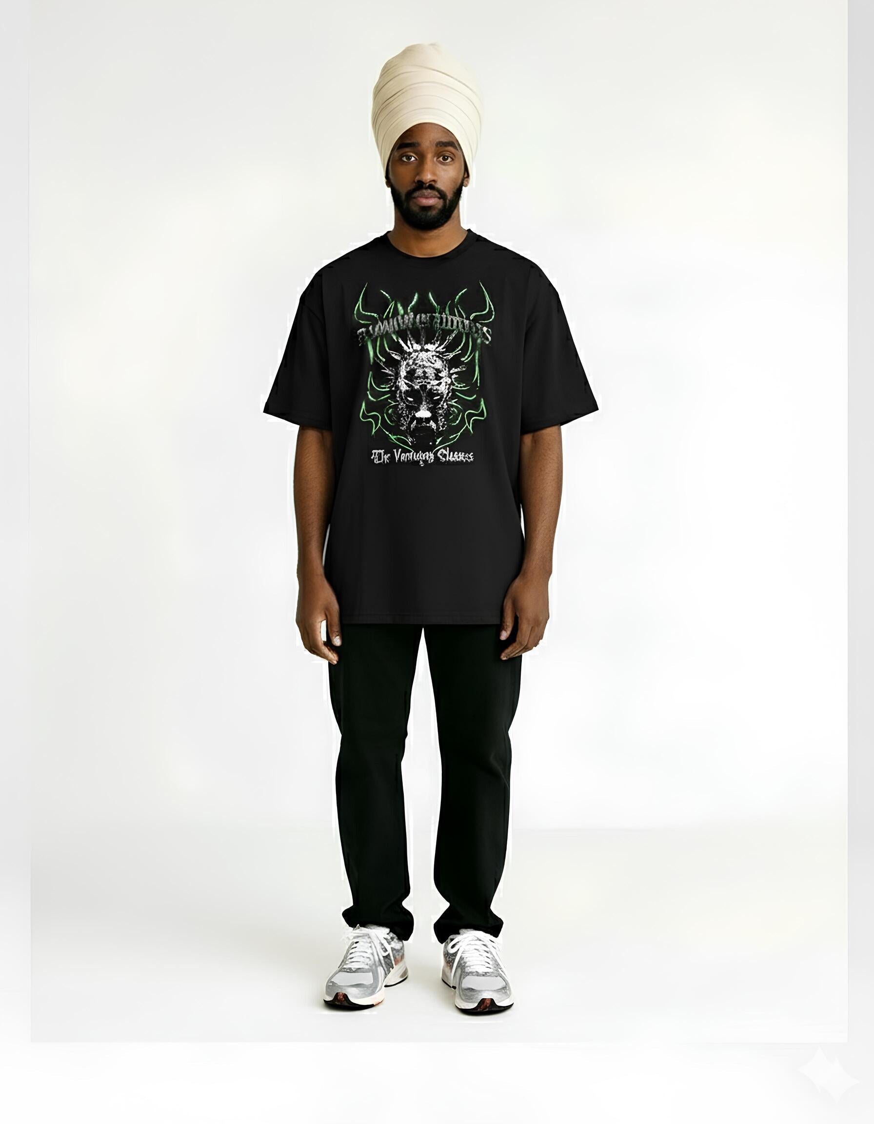 Person wearing a black t-shirt with a graphic design, black pants, and white shoes on a white background