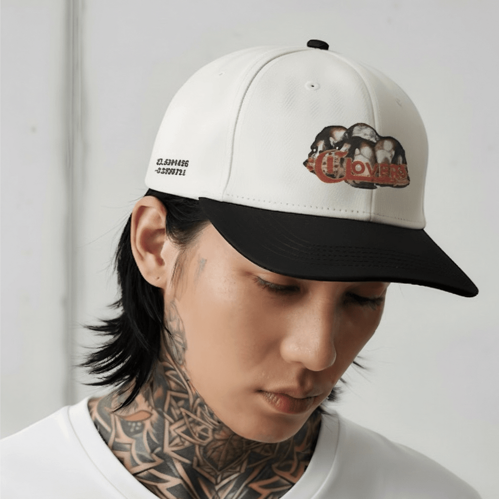 Person wearing a cap with a logo on a plain background