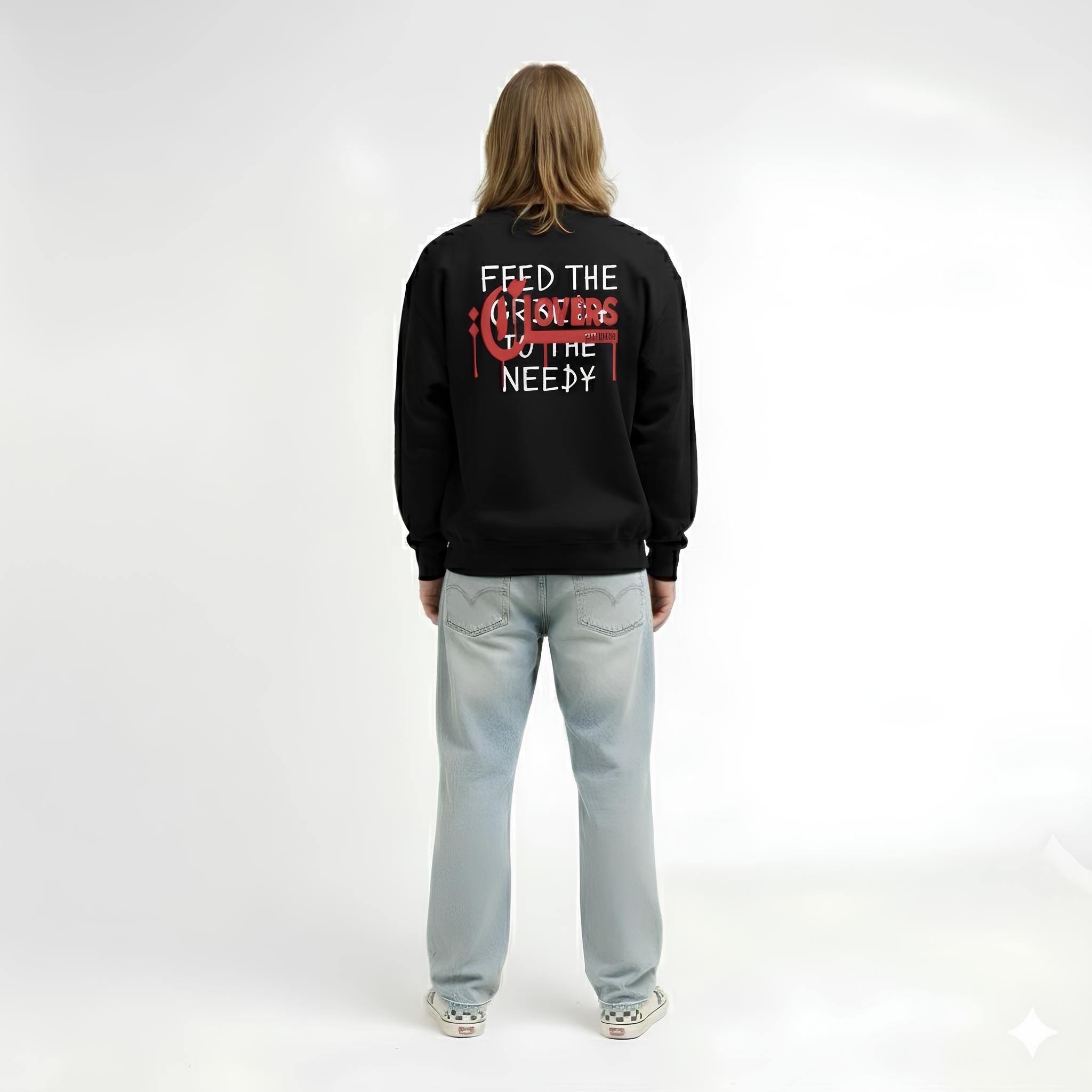 Person wearing a black sweatshirt with text on the back against a white background